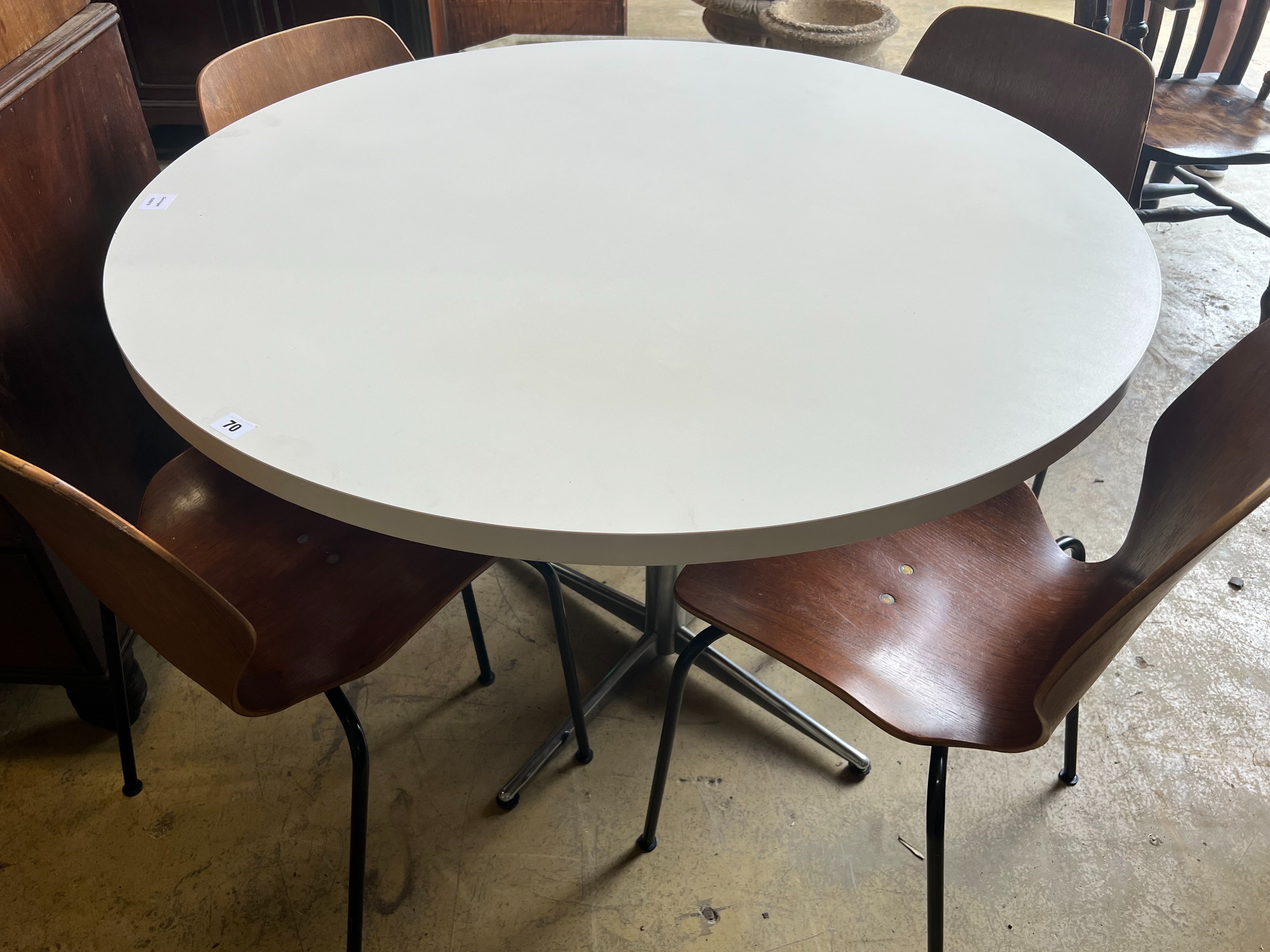 A set of four Westnofa chairs and a circular table, diameter 110cm height 77cm